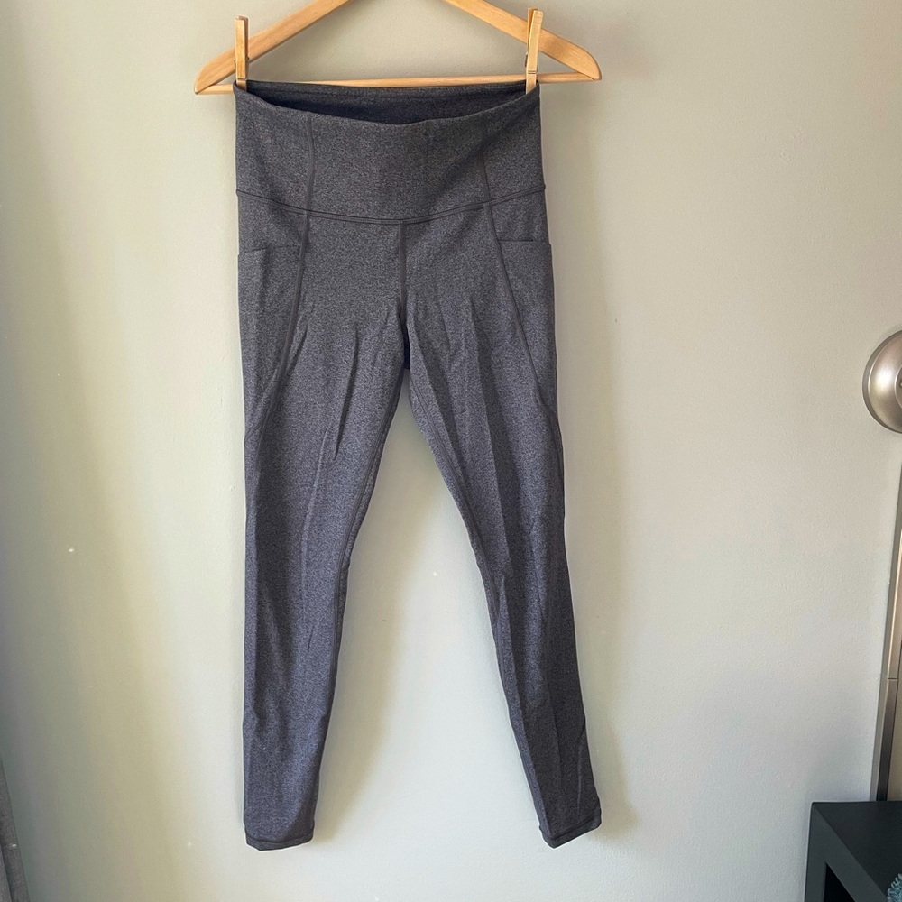 Athleta stash pocket salutation tight legging - sz S - gray